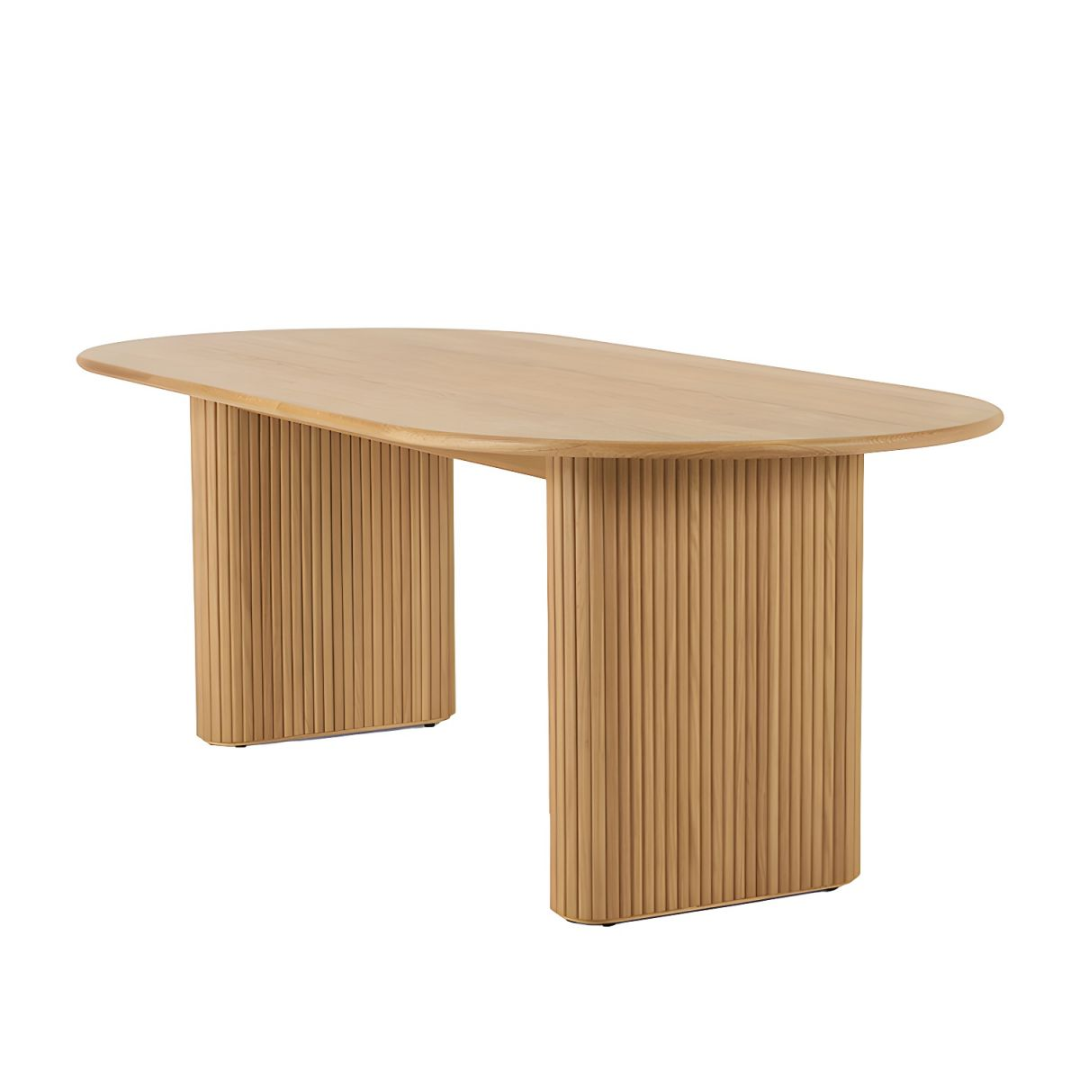 Solid Oak Oval Ribbed Dining Table with a ribbed design on a white background