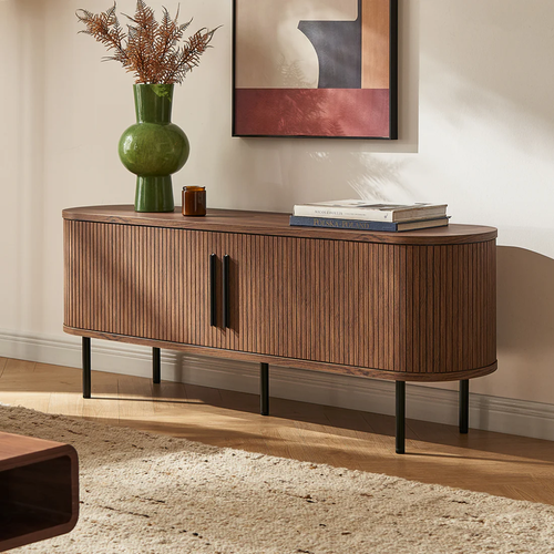 Dark Walnut Sideboard With Black Metal Legs with decorative items in a living room setting