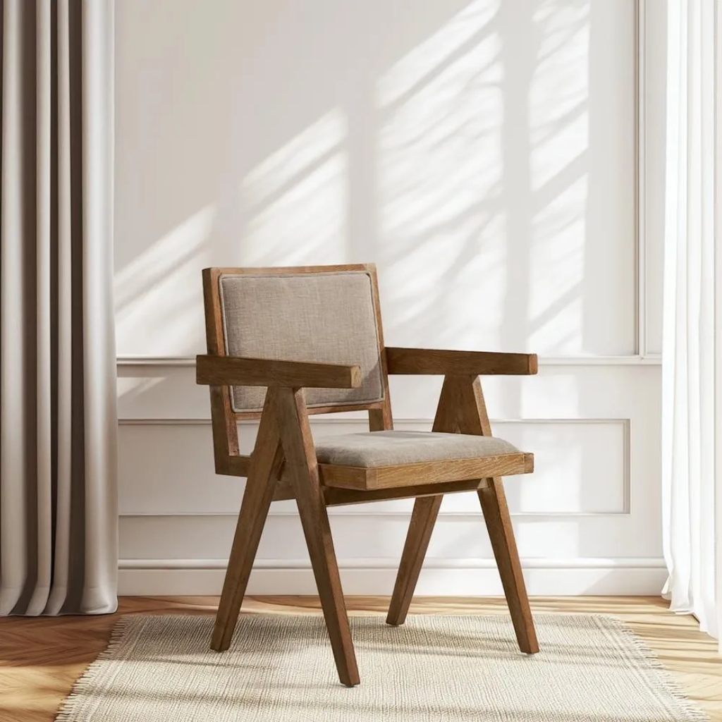 Teak Wood Linen Dining Chair With Arms in a bright dining room