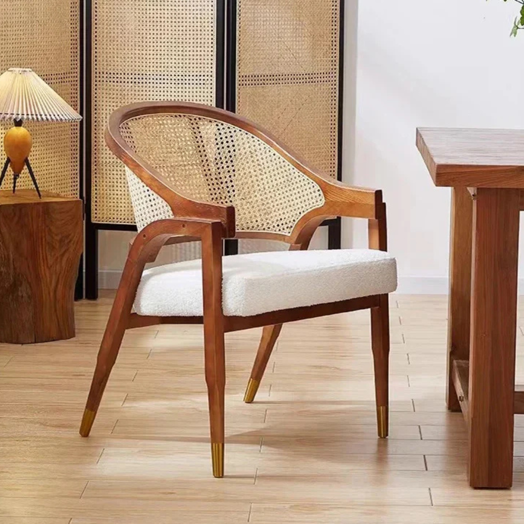 Rattan Wood And Boucle Dining Chair With Arms in  a mid century inspired dining room