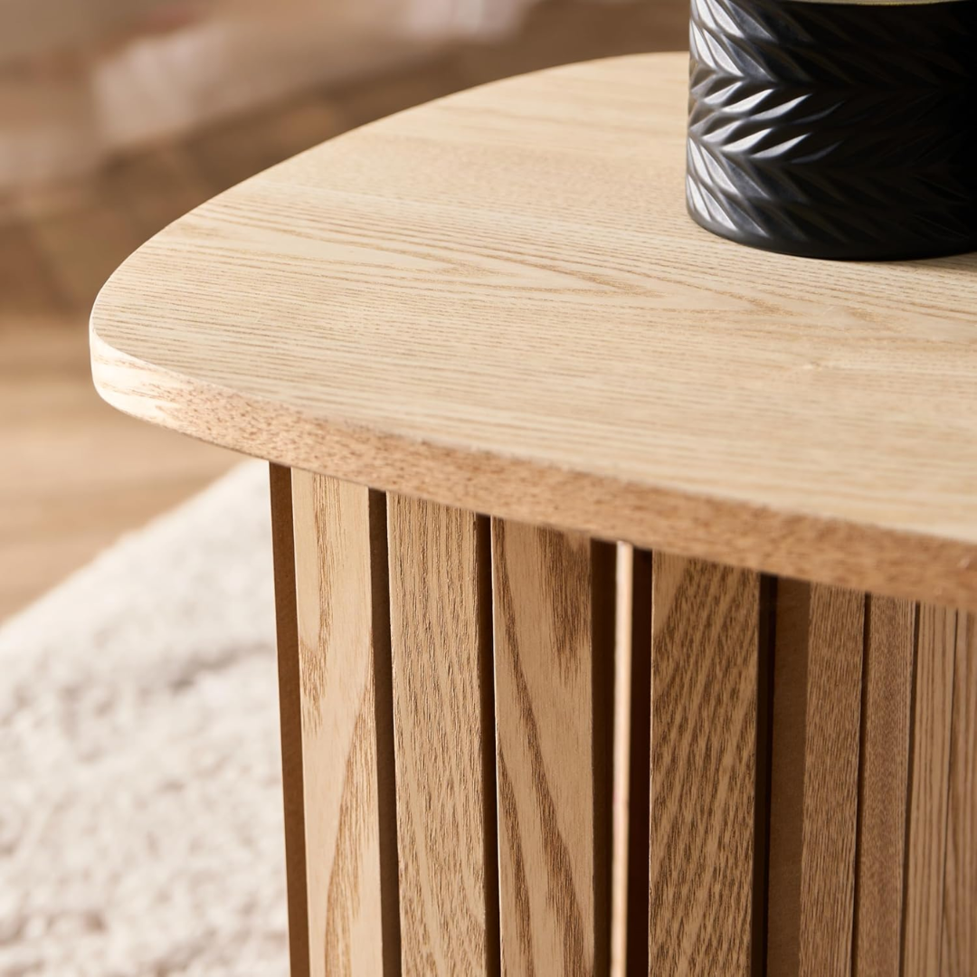 Close-up of a Light Oak Ribbed Coffee Table with a blurred background