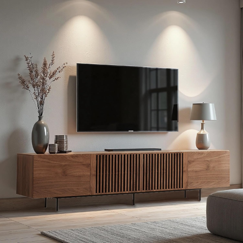 Modern living room with a wooden TV stand, television, and decorative items.