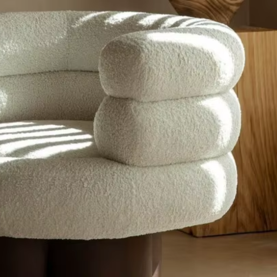 White Curved Swivel Boucle Accent Chair close up of the boucle fabric