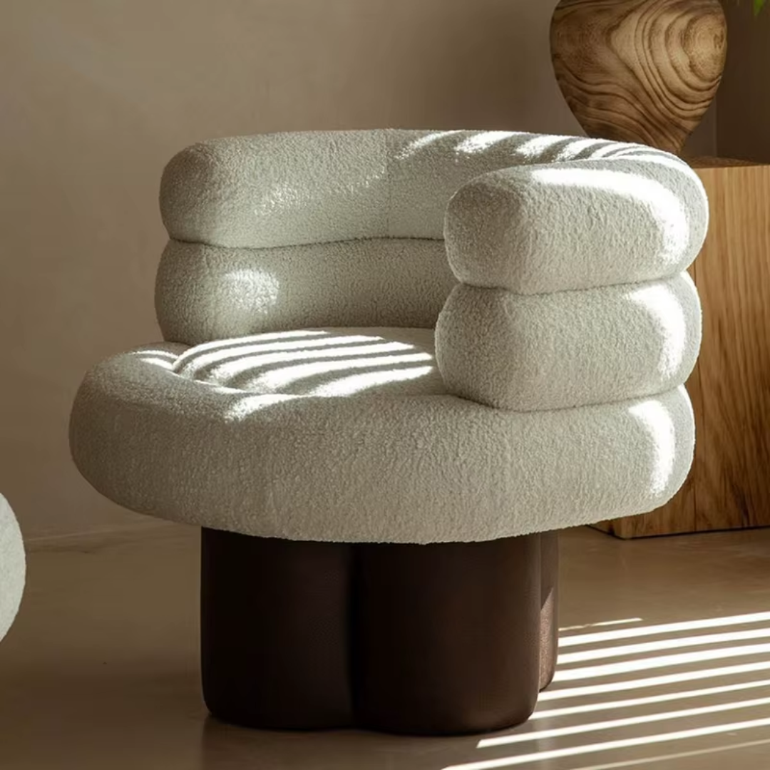 White Curved Swivel Boucle Accent Chair with textured design in a softly lit room