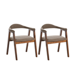 Two matching wooden dining armchairs with curved backrests and upholstered seats in a warm taupe fabric, shown on a plain white background.