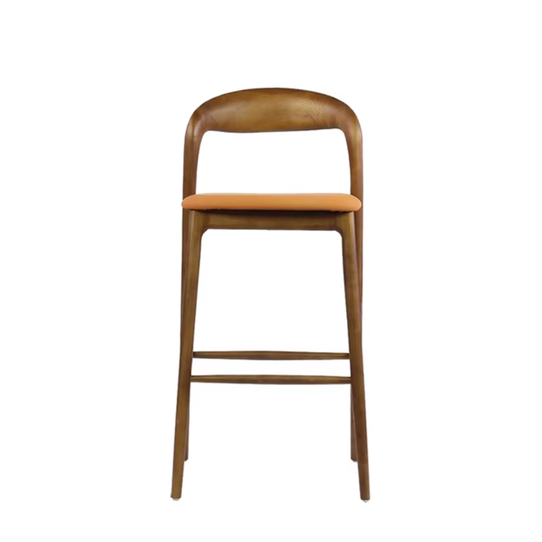 Wooden bar stool with a orange  seat on a white background