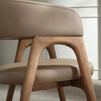 Beige Leather Dining Chair close up of the leather upholstery and wood