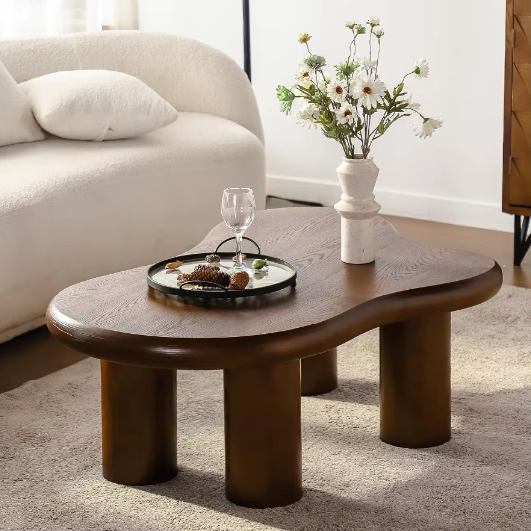 Dark Wood Coffee Table with a vase of flowers and a tray in a living room setting.