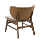 A mid-century modern accent chair shown from the back, featuring a curved tan leather backrest, a textured beige bouclé seat and backrest trim, and a medium brown wooden frame.