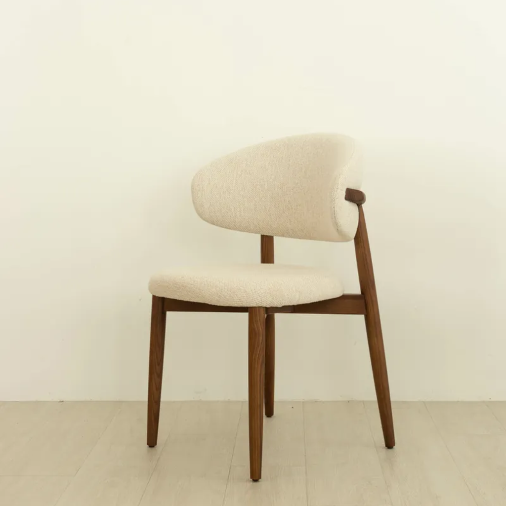 cream Dining Chair With Walnut Legs on a beige background on a light background