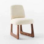 Neutral Boucle Dining Chair with white cushioned seat and backrest on a white background