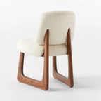 Neutral Boucle Dining Chair  with wooden frame and white cushion on a white background