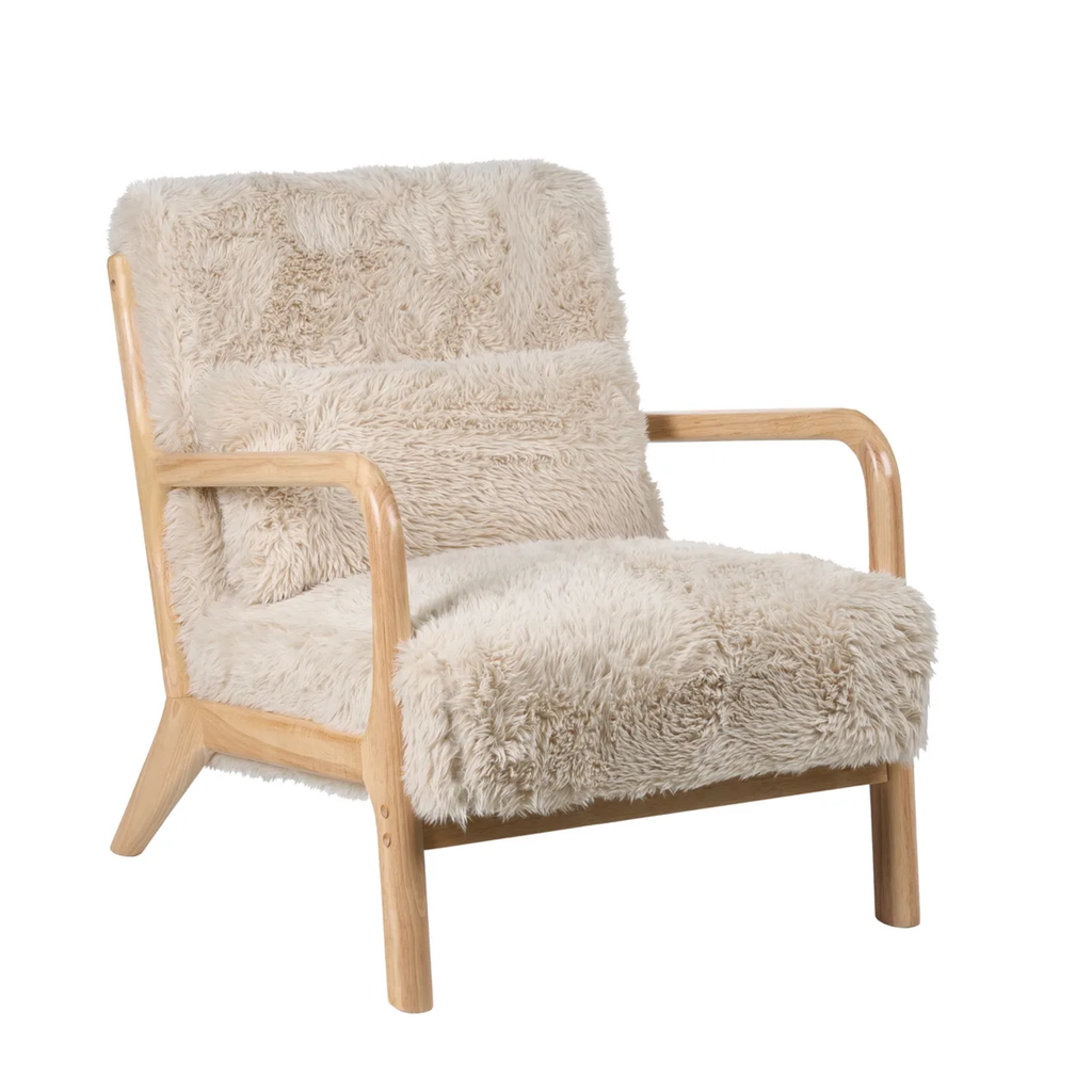 A mid-century modern accent chair featuring a light natural wood frame and thick, plush cream-colored sheepskin upholstery on the seat and backrest, shown against a solid white background.