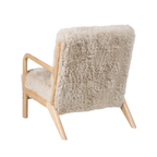 A mid-century modern accent chair featuring a light natural wood frame and a thick, shaggy cream sheepskin-style backrest and seat cushion, shown against a solid white background.