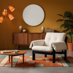 Cozy living room with a White Corduroy Armchair with Black Wood Frame, wooden coffee table, and round mirror on an orange wall.