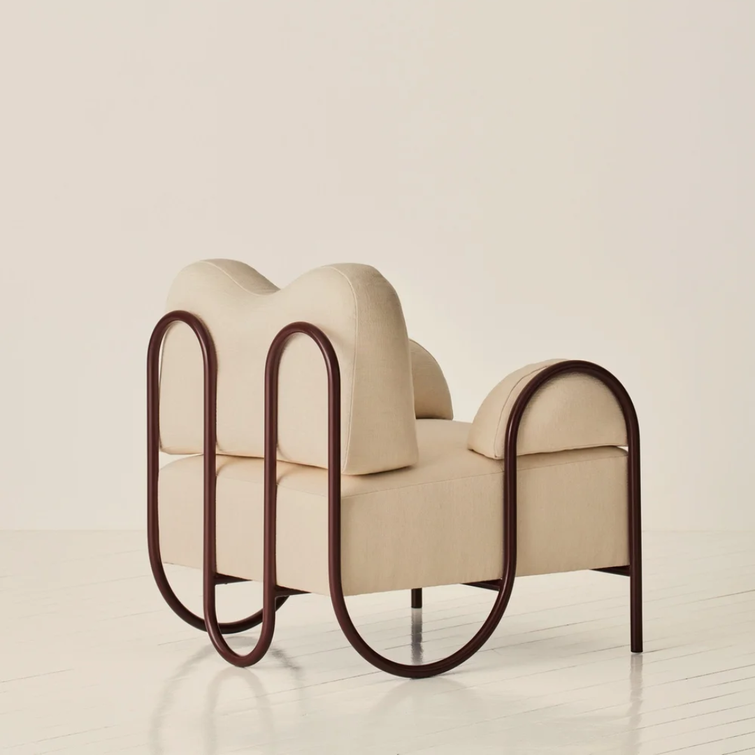 Beige Funky Occasional Chair back view with metal frame on a light background 