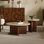 Wooden sideboard with Round Travertine Coffee Tables in a living room setting