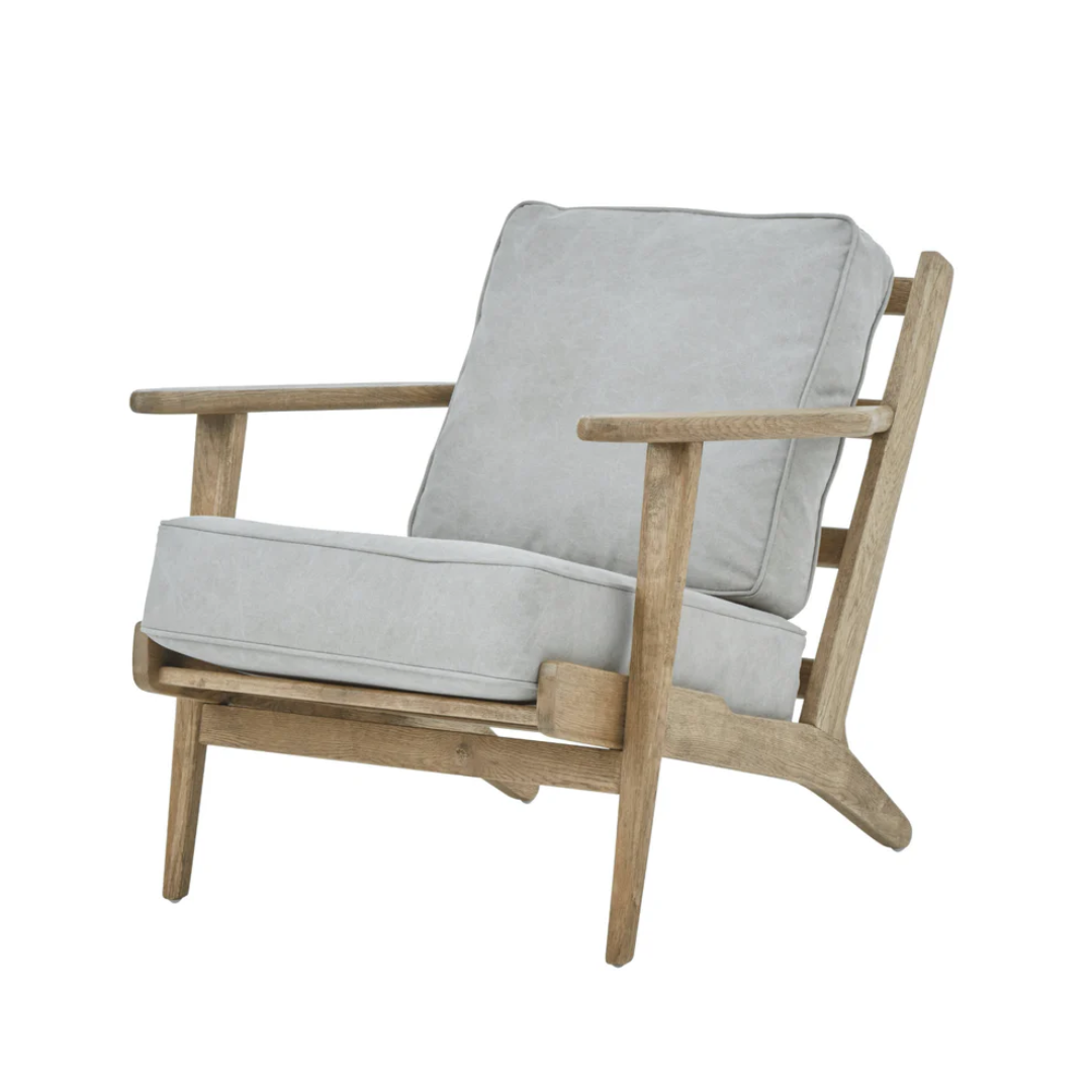 Wooden armchair with light gray cushions on a white background
