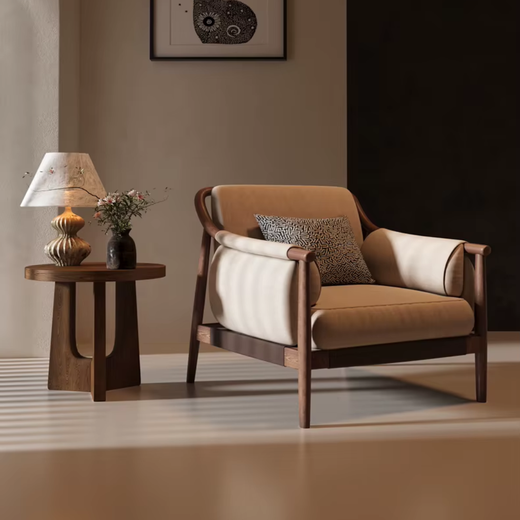 Brown Cushioned Armchair with wooden frame and beige cushion in a room with a side table and lamp.