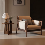 Brown Cushioned Armchair with wooden frame and beige cushion in a room with a side table and lamp.
