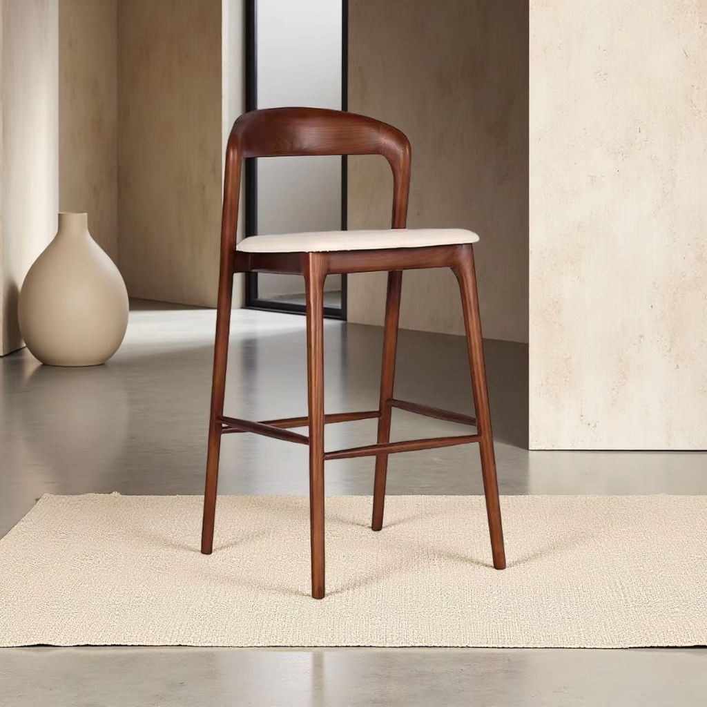 Wood And Cream Leather Bar Stool in a minimalistic setting.