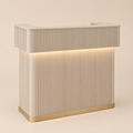 Beige reception desk with ribbed design and embedded lighting on a beige background