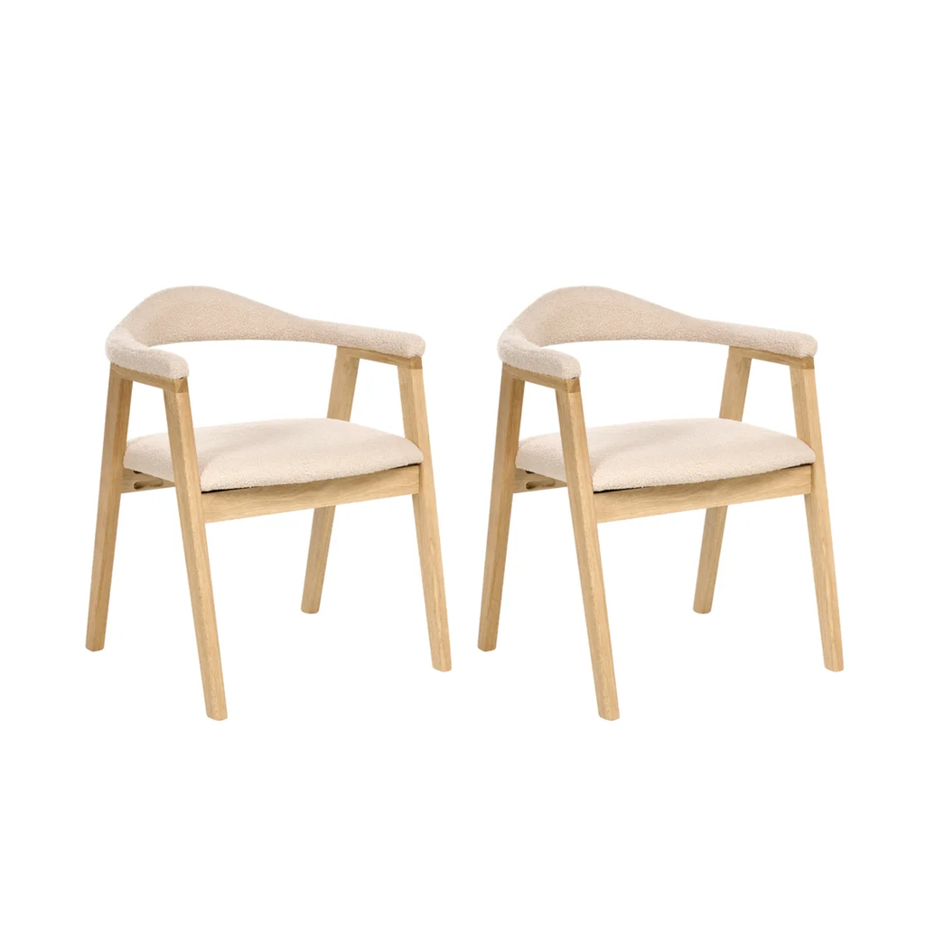 Two modern dining chairs with light natural wood frames and beige upholstered seats and armrests, shown on a plain white background.
