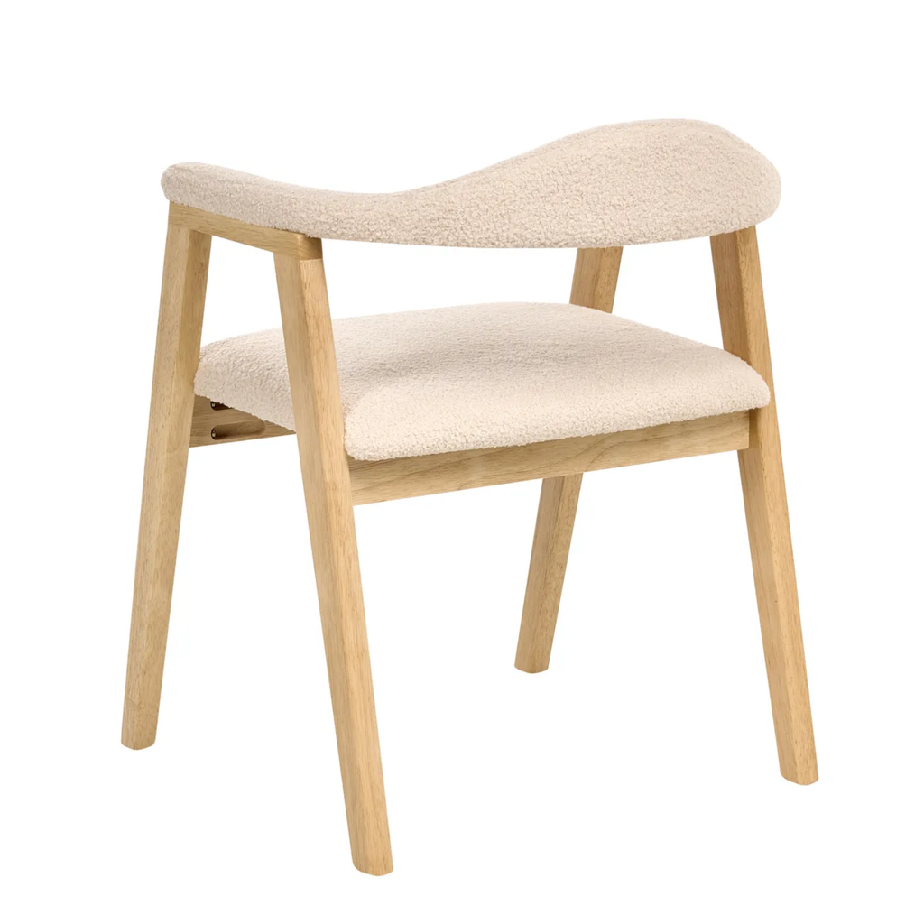 A modern dining chair with a light natural wood frame and cream-colored bouclé upholstered seat and curved backrest, shown on a solid white background.