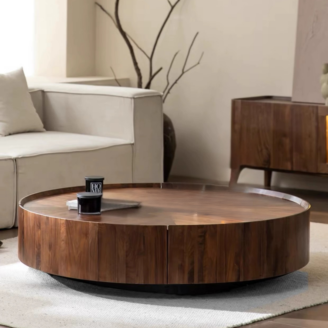 Round Walnut Wood Coffee Table with Hidden Storage in a living room setting with a beige sofa and decorative elements.