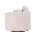 A modern round upholstered accent chair in a light beige textured fabric, shown from a side angle against a plain white background.