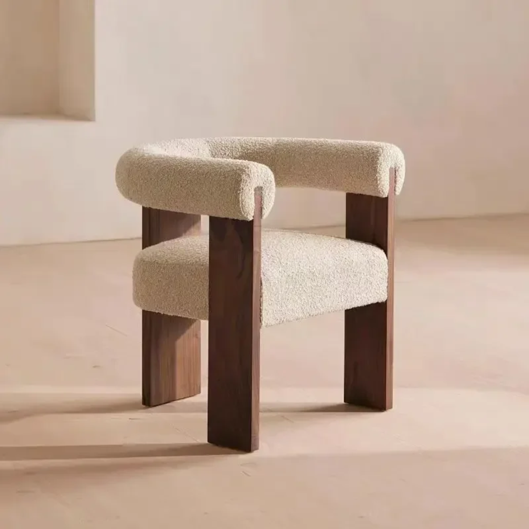 Dining Chair with wooden legs and beige cushioned seat and backrest on a neutral background