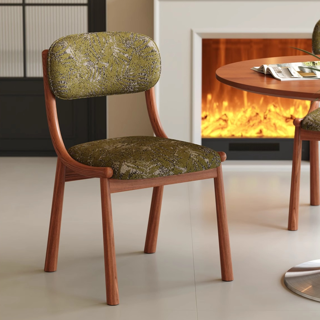 Green Fabric Dining Chair With Wooden Legs in a mid century dining room with a fireplace 