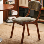  Green Fabric Dining Chair With Wooden Legs in a mid century dining room side view