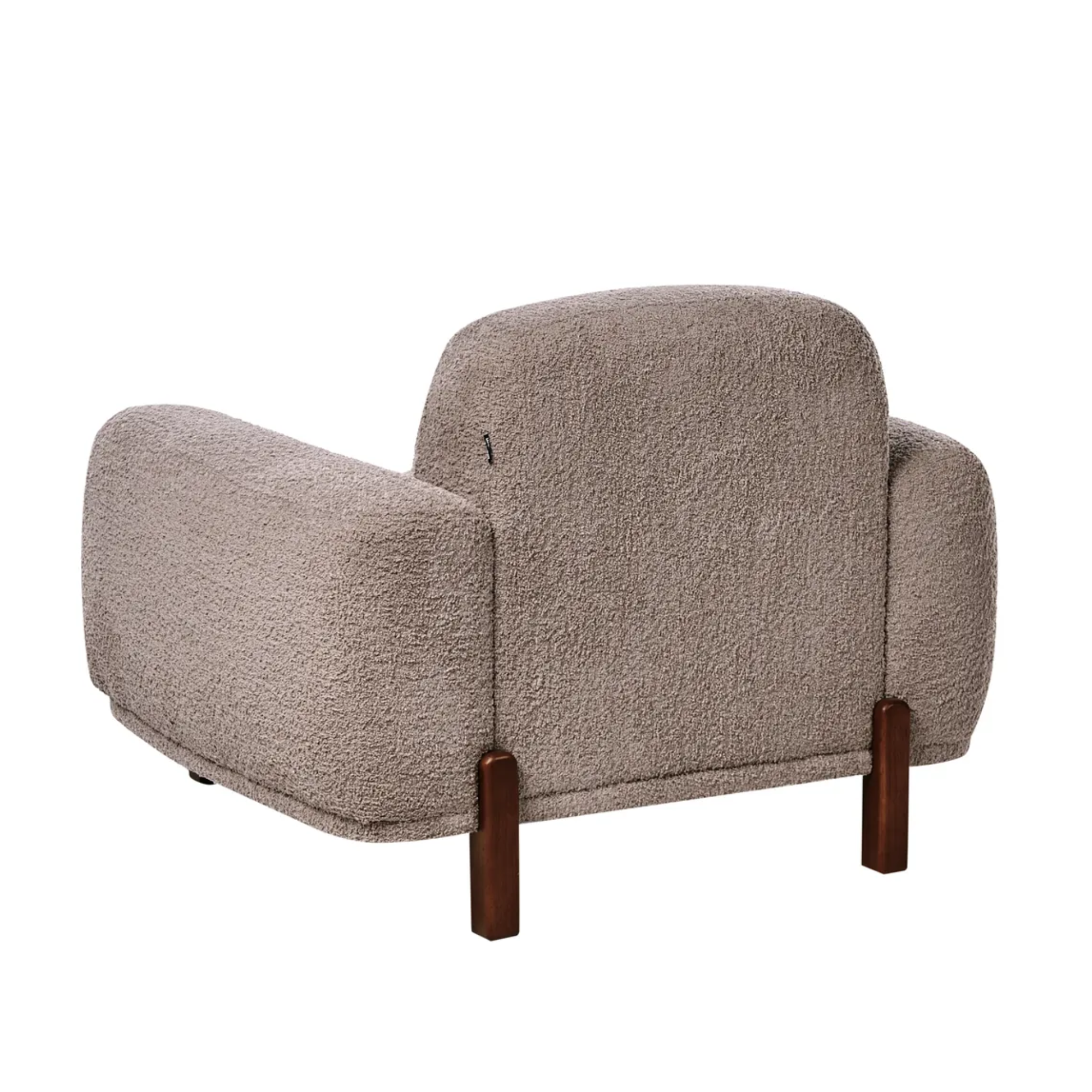 A modern bouclé armchair in a warm taupe-beige fabric with dark brown wooden legs, shown from a three-quarters angle on a white background.
