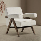  Boucle Fabric Statement Chair with wooden legs in a minimalistic setting