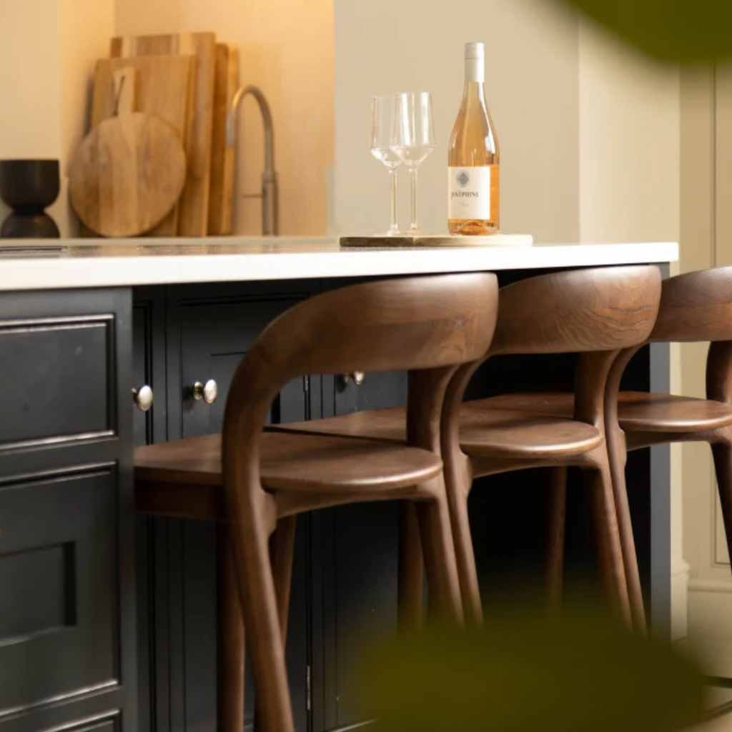 Rennick Light Wood Counter Stools With Backs And Metal Footrest