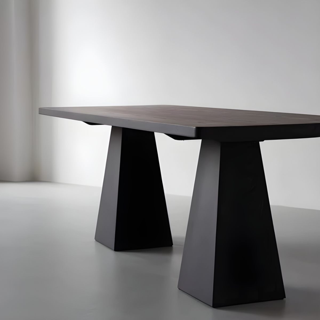 Modern  Black Rectangular Dining Table with unique legs on a plain background