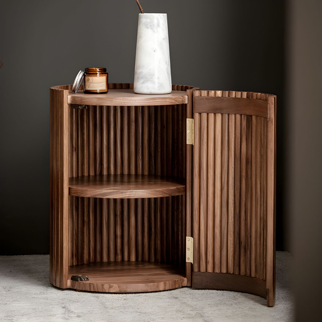 Walnut Side Table with Hidden Storage with marble vase and candle against a dark wall