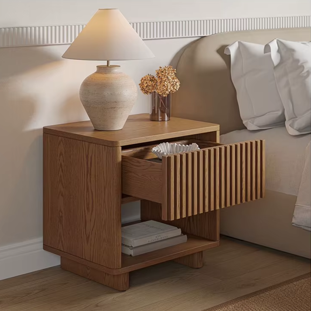 Fluted Bedside Table with Drawer and Shelf in a warm bedroom