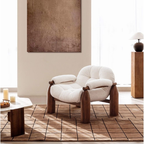 Statement Accent Chair With Walnut Wood Frame in a room with a painting and table.