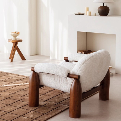 Statement Accent Chair With Walnut Wood Frames in a minimalistic room
