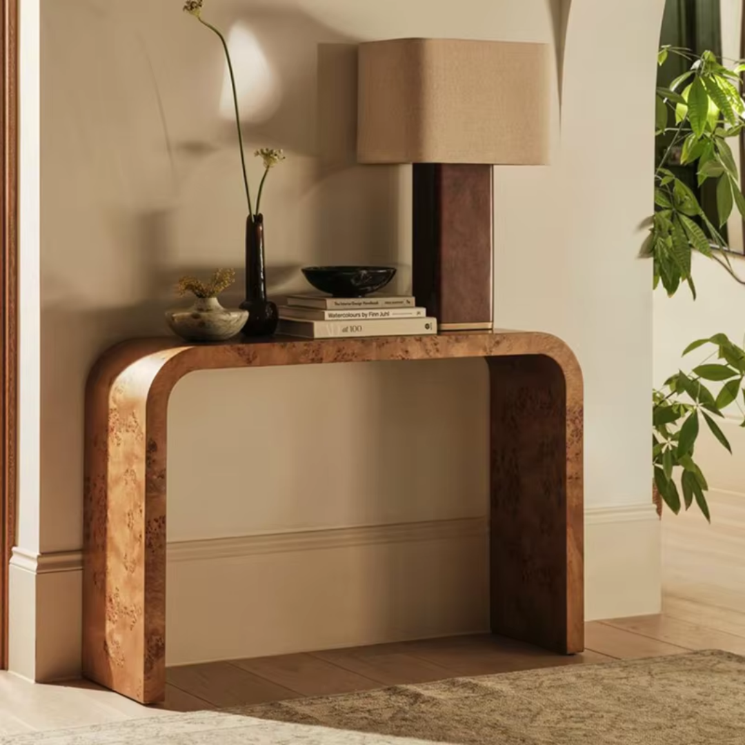 Marble Top Console Table With Rounded Corners with decorative items in a room setting