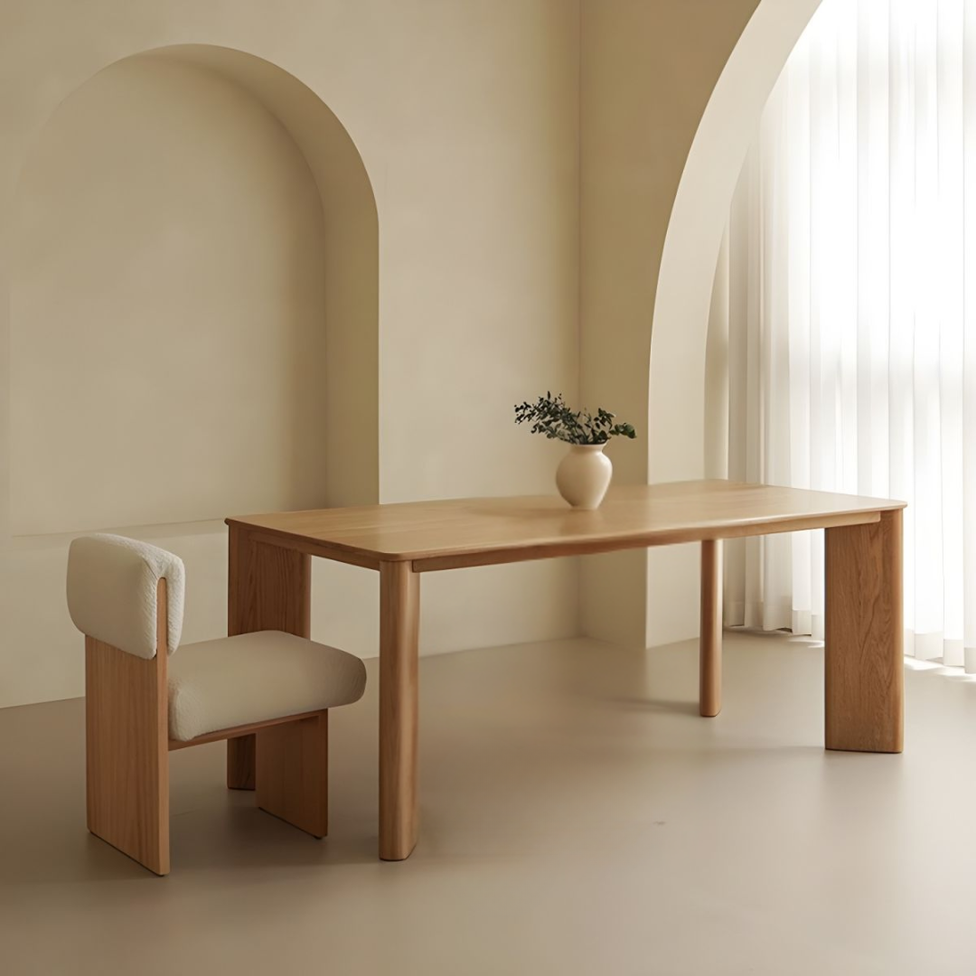 Rectangular Wooden Dining Table with a chair in a minimalistic room with neutral colors